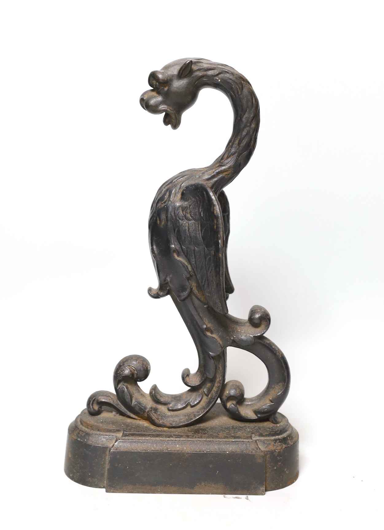 A Victorian cast iron ‘wyvern’ door stop, 32cms